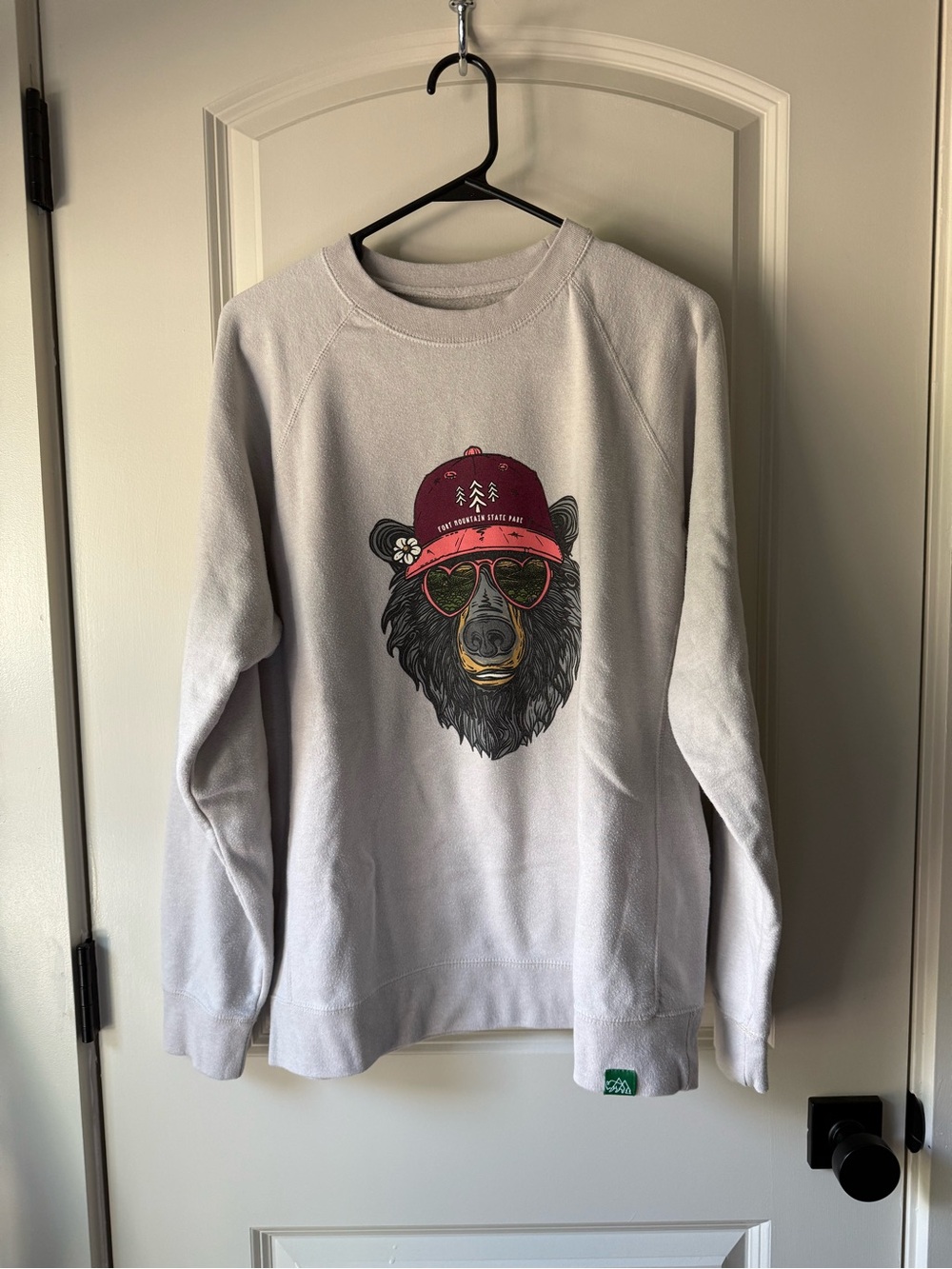 Cream Fort Mountain Stare Park Sweatshirt with Bear Graphic and Maroon Cap